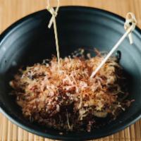 Takoyaki (5) · Baked octopus pastries, aonori with special sauce and katsuobushi.