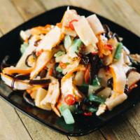 Squid Salad · Savory, Japanese squid salad with mushroom and bamboo shoots served cold.