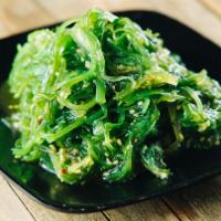Seaweed Salad · Japanese seaweed salad topped with sesame oil.