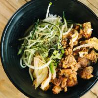 Oyako Don · Steamed rice bowl topped with chicken karaage, sliced onions, diced green onion, broken egg,...