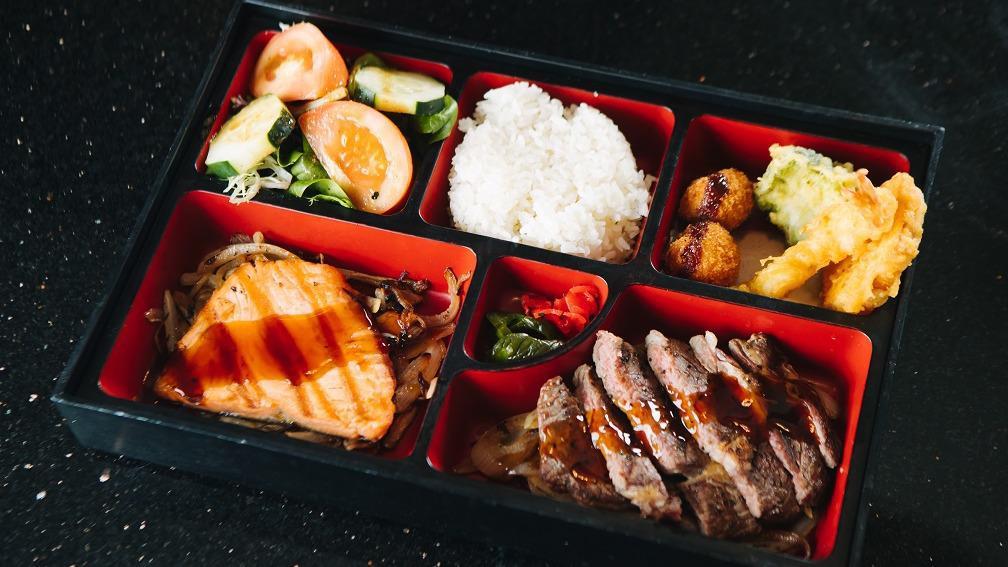 Bento · Served with miso soup, salad, and rice. Every bento box includes 3 pcs of tempura and 2 pcs of croquette. Choose 2 main dishes.