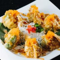 Stuffed Jalapeno · 6 pcs of lightly battered deep-fried jalapeno stuffed with spicy tuna, crab meat, and cream ...