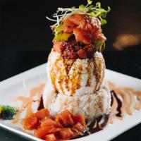 Happy Ahi Tower · Spicy. Sushi rice, spicy tuna, avocado, crab meat, and ahi tuna with 4 different kinds of ca...
