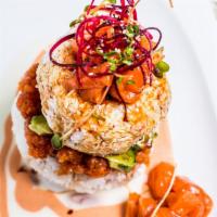 Happy Salmon Tower · Spicy. Sushi rice, spicy salmon, avocado, crab meat, and salmon with 4 different kinds of ca...
