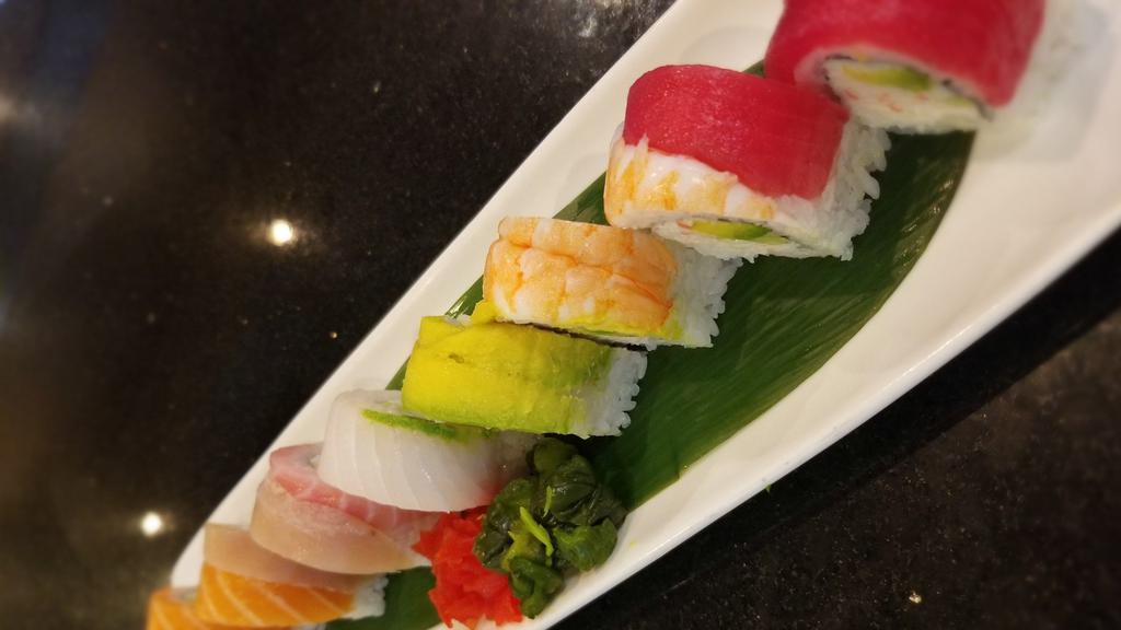 Rainbow · California roll topped with ahi tuna, salmon, red snapper, albacore, shrimp, and avocado, served with ponzu sauce.