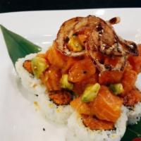 Salsa Dance · Spicy. Spicy tuna roll topped with salmon, avocado, tomato, and smelt egg mixed with Japanes...