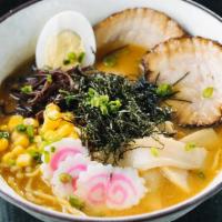 Miso Ramen · Ramen noodle soup served with bamboo shoot, corn, green onion, cooked egg, and sweet-roasted...