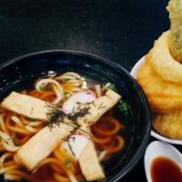 Tempura Udon · Traditional Japanese noodle soup with shrimp and vegetable tempura.