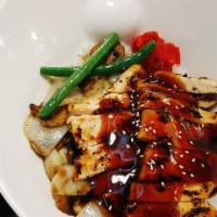 Chicken Teriyaki Bowl · Grilled chicken breast and sauteed vegetables over rice in a bowl, served with teriyaki sauce.