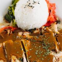 Japanese Curry · Sauteed vegetables over rice in a bowl, served with house Japanese curry sauce.