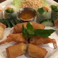 Tt Sampler · Shrimp parcel, vegetable spring rolls, vegetable summer rolls, and crab supreme.
