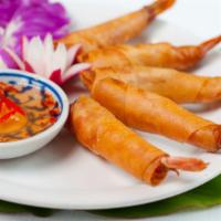 Shrimp Parcel · Seasoned shrimp, wonton wrapping, homemade dipping sauce.
