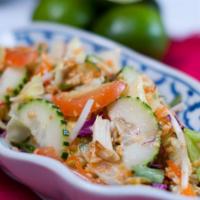 Thai Topaz House Salad · Gluten-free, vegan. Iceberg lettuce, cucumbers, tomatoes, basil in light, peanut dressing.