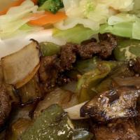 Large Pepper Steak · Green bell peppers, onions, steak includes steam rice.