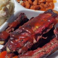 Juicy Ribs · Includes 2 sides.