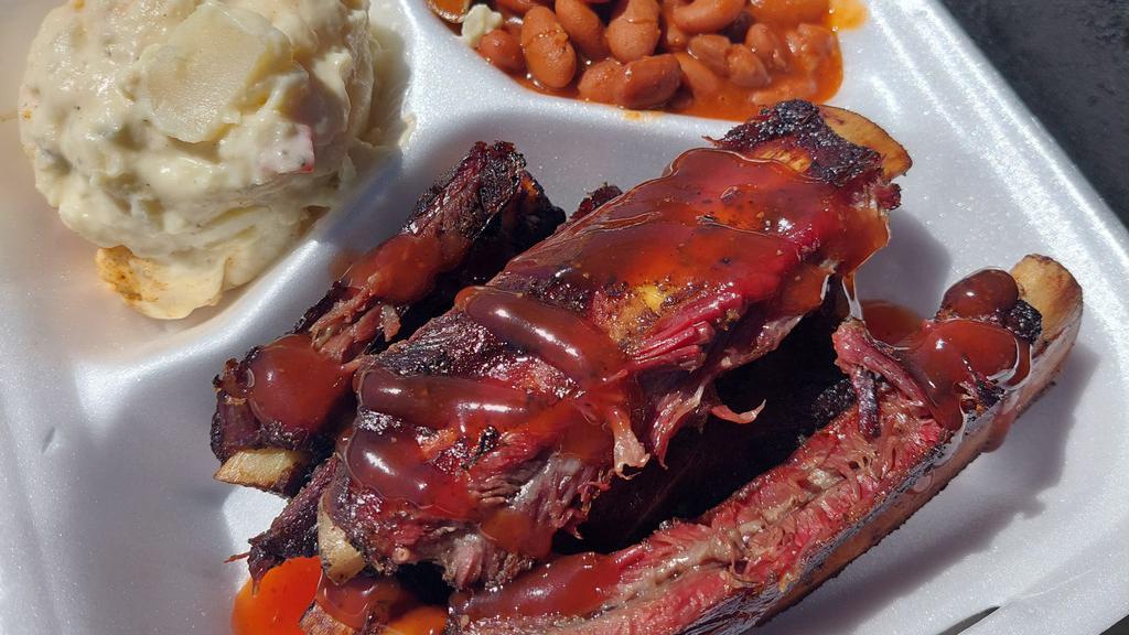 Juicy Ribs · Includes 2 sides.