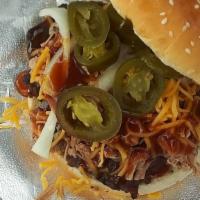 #Bbqqueensignaturesanmich · Homemade Beef Patty topped w/Brisket  & cheese on bun chips included