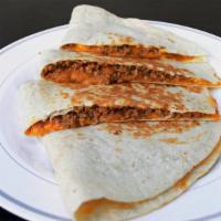 Ground Beef Quesadilla · Flour tortilla with Cheddar cheese and ground beef.