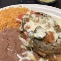 Chile Relleno Dinner · Spicy. Poblano pepper stuffed with picadillo topped with cheese and salsa ranchera, served w...