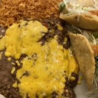 Dinner Platter · Three cheese enchiladas served with two beef puffy tacos, rice and beans.