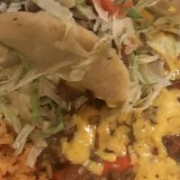 Ladies'/Macho Special · Two cheese enchiladas, two beef puffy tacos.