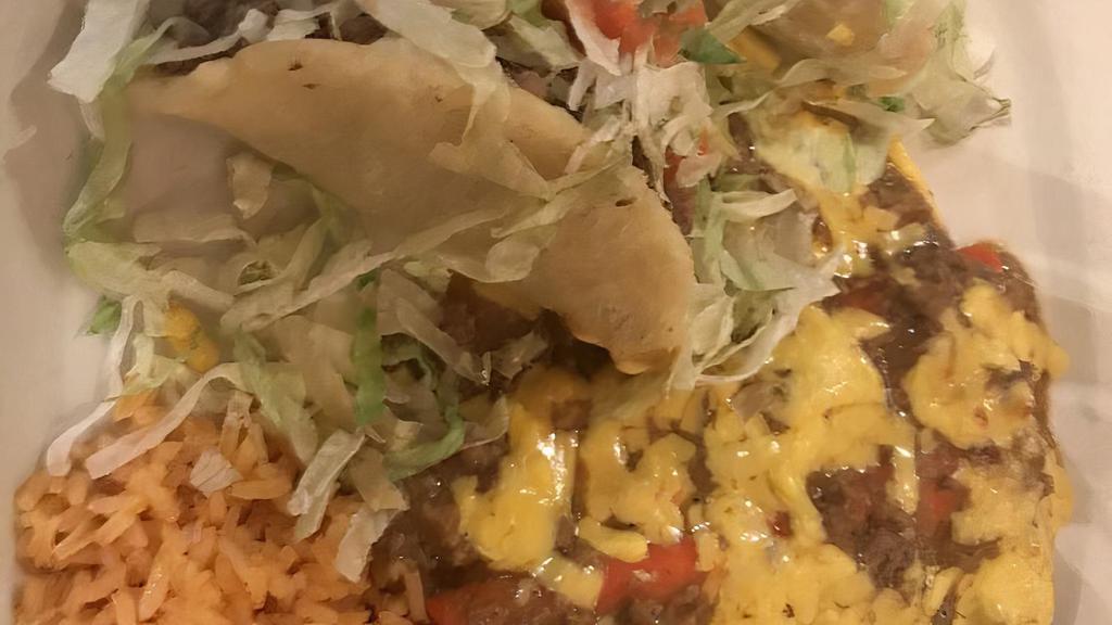 Ladies'/Macho Special · Two cheese enchiladas, two beef puffy tacos.