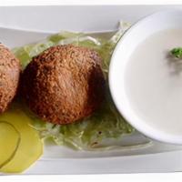 Falafel (4 Pc) · 4 Croquettes of ground chickpeas seasoned with herbs, spices then deep-fried. Served with ta...