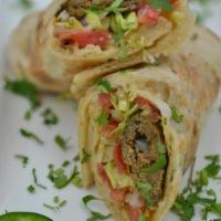 Beef Seekh Kabob Wrap · Minced beef marinated with traditional South Asian spices grilled on a skewer and rolled in ...