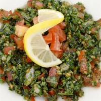 Tabouleh Half (8 Oz) · Levantine vegetarian salad made of mostly finely chopped parsley with tomatoes, mint, onion,...
