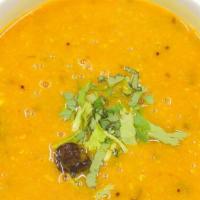 Khaati Daal Half (8 Oz) · Split red lentils made with tamarind and other rich ingredients made into tangy curry.