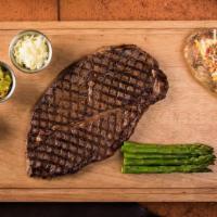 Top Sirloin · 10 oz. Includes pineapple coleslaw, beans, a dinner roll, and your choice of one side.