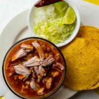 Pozole · Hominy, blend of dry peppers and spices and pork.