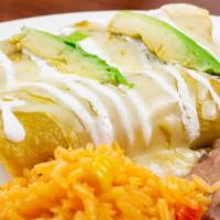 Suizas · Filled with shredded chicken. Topped with a creamy tomatillo sauce, melted Oaxaca cheese, an...