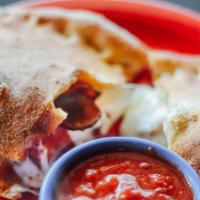 Meat Calzone · Pepperoni and sausage.