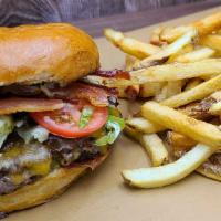 Bacon Cheeseburger · (L, T, O, P, M-M) W/ CHEDDAR CHEESE AND CRISPY BACON.  FRIES INCLUDED