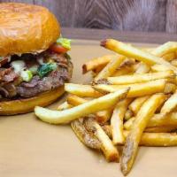 Brisket Cheeseburger · (L, T, O, P, M-M) W/ CHEDDAR CHEESE, SMOKED BRISKET AND BBQ SAUCE.  FRIES INCLUDED