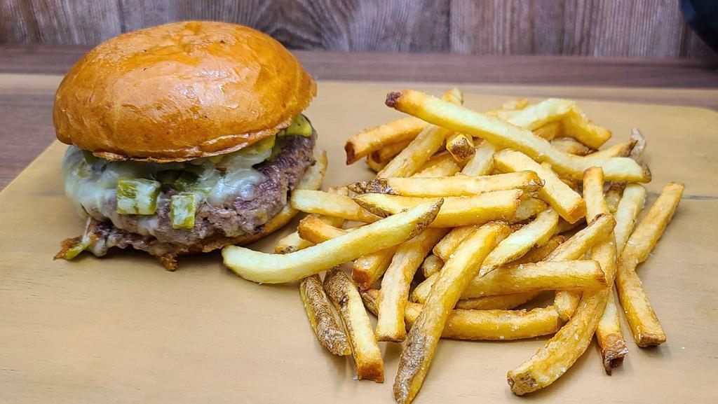 Green Chile Burger · (O, P, MST) W/ JACK CHEESE AND ROASTED GREEN CHILES.  FRIES INCLUDED