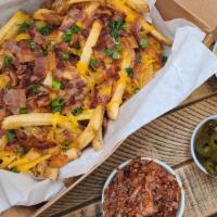 Bbq Brisket Fries · HANDCUT FRIES W/ CHEDDAR, BACON BITS, GREEN ONIONS, PICKLED JALAPENOS, QUESO AND BBQ BRISKET