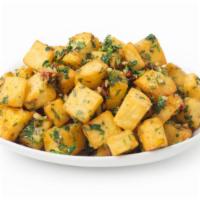 Spicy Potatoes · Spicy seasoned potatoes cooked.