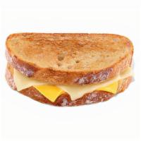 Grilled Cheese · Toasted Sourdough bread with white cheddar and American cheese.