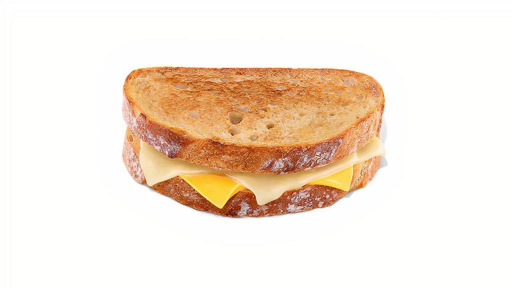 Grilled Cheese · Toasted Sourdough bread with white cheddar and American cheese.