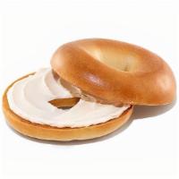 Bagel With Cream Cheese Spread · A delicious way to start your day. Soft and chewy, these freshly baked bagels come in some o...