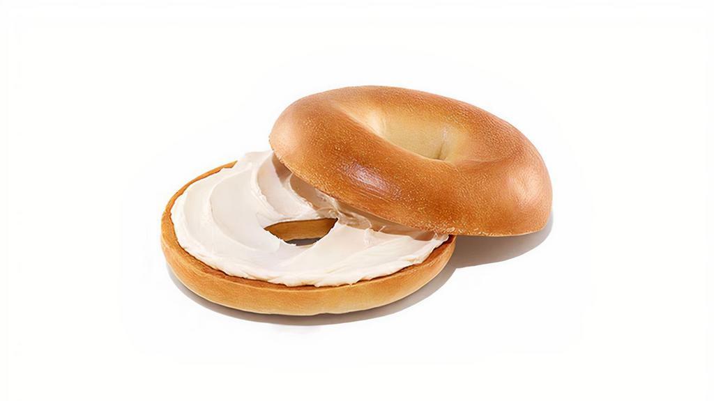 Bagel With Cream Cheese Spread · A delicious way to start your day. Soft and chewy, these freshly baked bagels come in some of your favorite varieties.
Bagels Available in the following varieties*: Plain; Cinnamon Raisin; Multigrain; Sesame Seed; Everything.   
*Availability may vary depending on location.