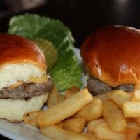 Angus Sliders · 2  sliders with Premium angus beef, aged cheddar cheese, pickled red onions, cowboy sauce on...