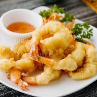 Butterfly Shrimp · Tempura-battered shrimp, served with homemade sweet & sour sauce. (6)