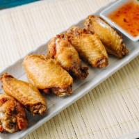 Thai Spiced Wings · Wings marinated in Thai spices and deep-fried, served with homemade sweet & sour sauce. (6)