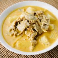 Yellow Curry · Yellow curry sauce, simmered with coconut milk, white onion, and potatoes. Served with choic...
