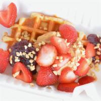 Pb N' J · Toasted Belgian waffle with peanut butter icing, strawberry jam, fresh strawberries and toas...