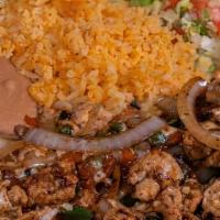 Pollo Picado · Chicken breast tips sauteed with onions, tomatoes, green chile, & cheese.
