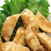 Fried Dumplings (4 Pcs) · Fried pork dumplings served with soy sauce & sesame oil or sweet & sour sauce .